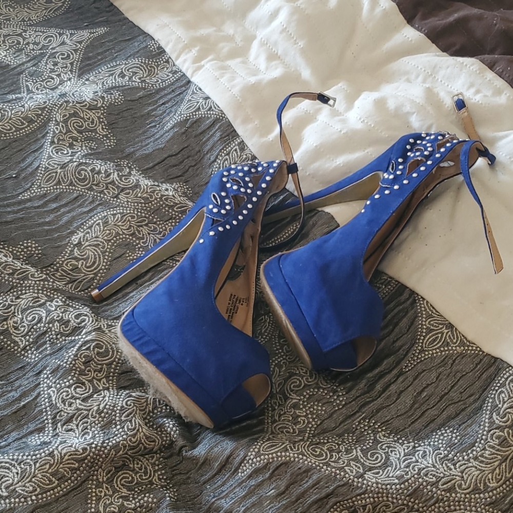Navy blue  with ankle  strap warn once